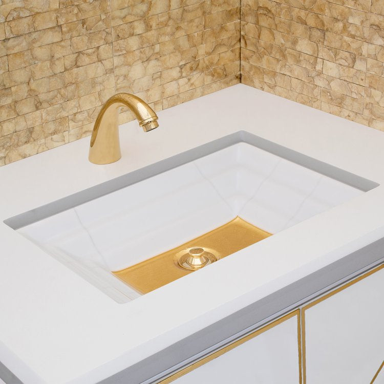 white glass with gold accent sink