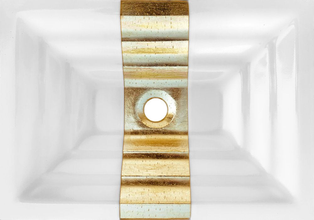 white glass with gold accent sink