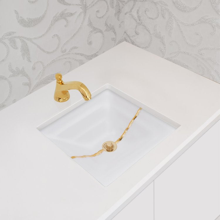white glass with gold accent sink